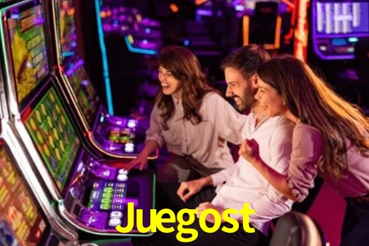 Escena dinámica inspirada en casino con iluminación Juegost, cartas, fichas e íconos de juegos digitales en un espacio moderno de juegos.